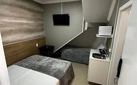 Loft Lux SM Chapecó | Conforto Premium com Ar, Cozinha e Smart TV